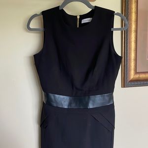 Calvin Klein sleeveless sheath dress with faux, leather detail, fully lined